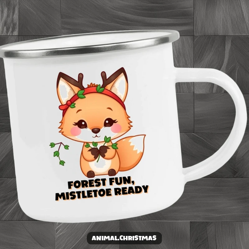 Funny kawaii fox wearing a reindeer headband, holding mistletoe, a sturdy camping mug for outdoor fun.
