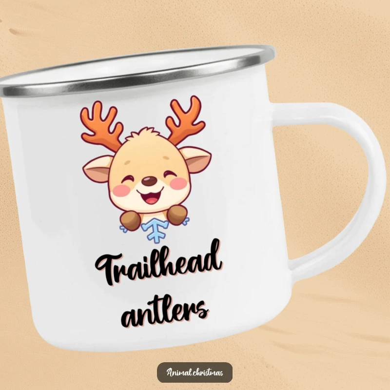 Funny camping mug with a cute animal with antlers, peeking from behind a snowflake, ideal for outdoor holiday enthusiasts.