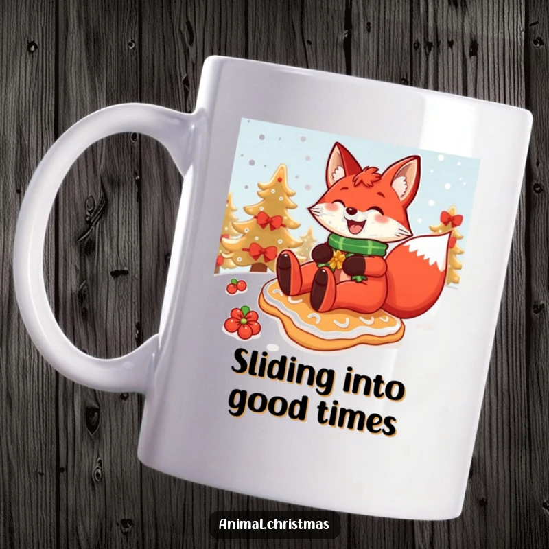 Funny Christmas mug featuring a red fox grinning widely while sliding down a snowy hill on a festive gingerbread cookie.