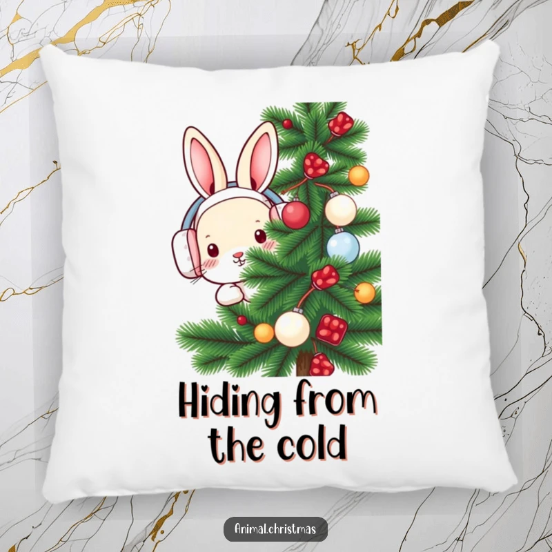Funny rabbit pillow featuring a rabbit in earmuffs peeking from behind a decorated pine tree, adding cozy winter charm.