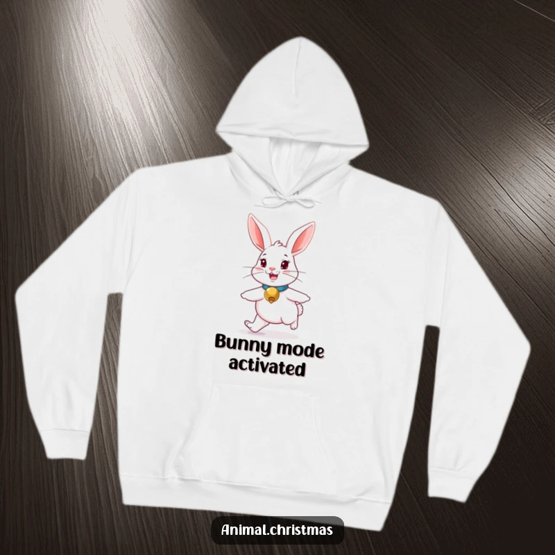Funny rabbit hoodie featuring a cute bunny with a jingle bell collar, hopping merrily, cozy and stylish.
