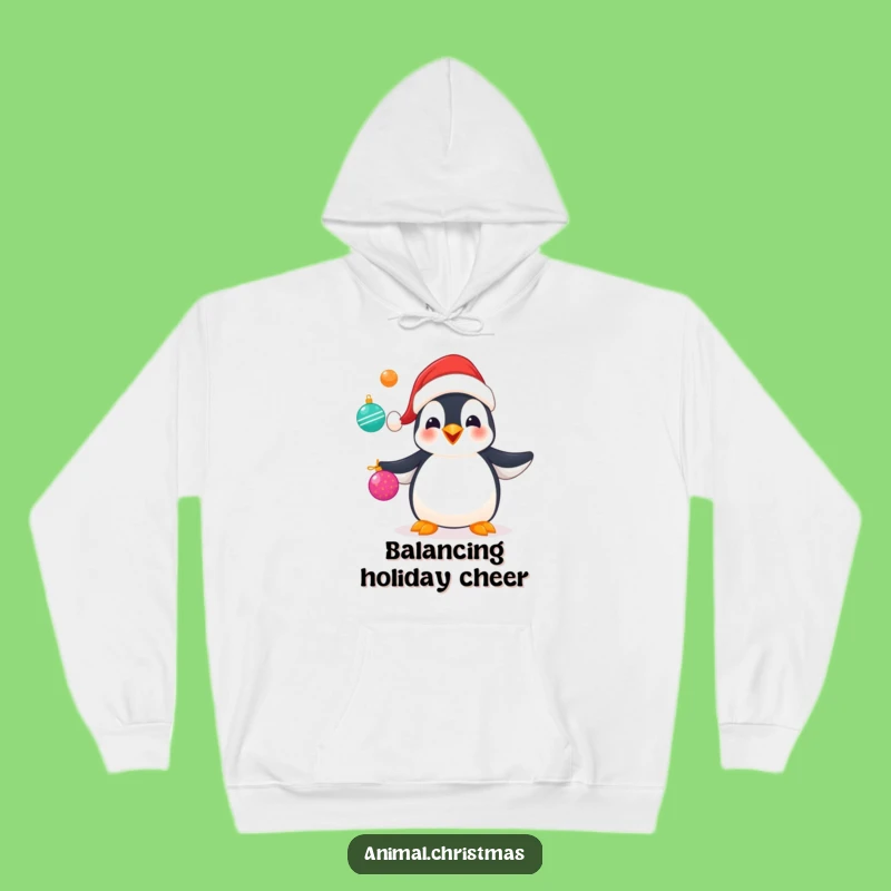 Cozy Funny Penguin Juggling Hoodie: Warm Up with Holiday Laughter and Cheer