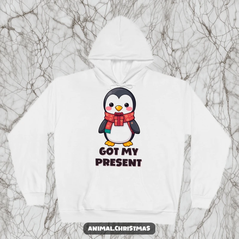 Funny hoodie with a penguin sporting a festive scarf and holding a gift, offering warmth and holiday cheer for wearers.