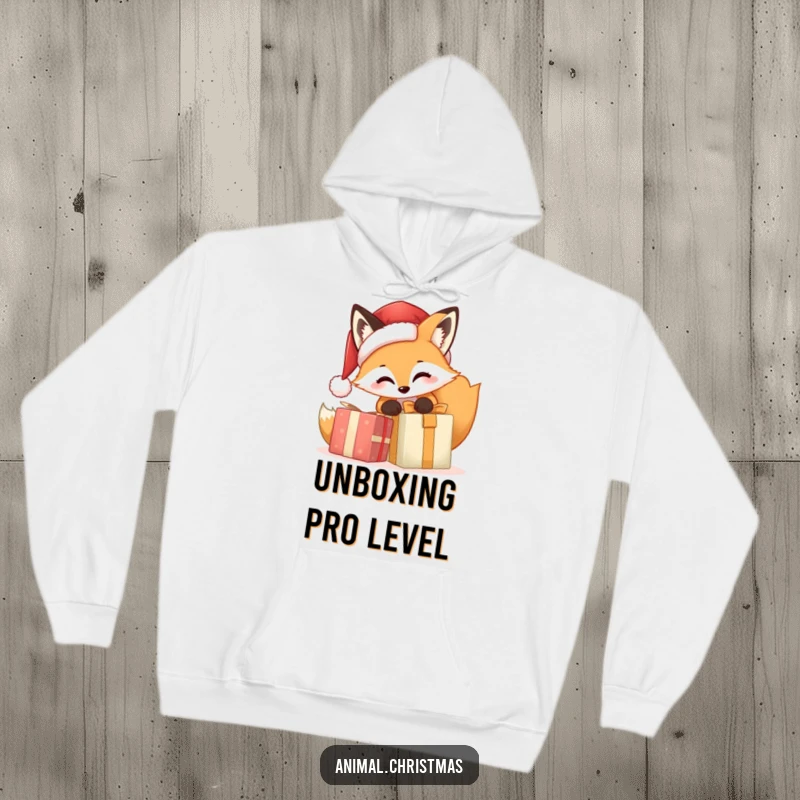 Funny Fox Santa Hoodie, a cartoon fox in a Santa hat joyfully unwrapping a Christmas present, radiating warmth and holiday festivity, ideal for cozy humor.