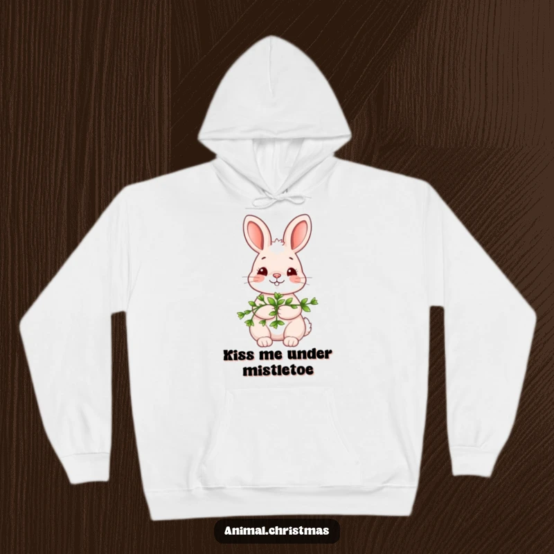 Funny kawaii bunny hoodie, holding mistletoe with a shy smile, warm and cozy holiday wear, cute and romantic design.