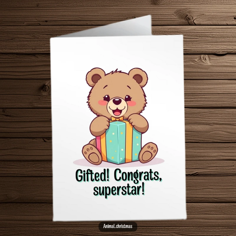 Funny free printable congratulations card: a bear cub eagerly unwraps a colorful present, symbolizing the joy of success.