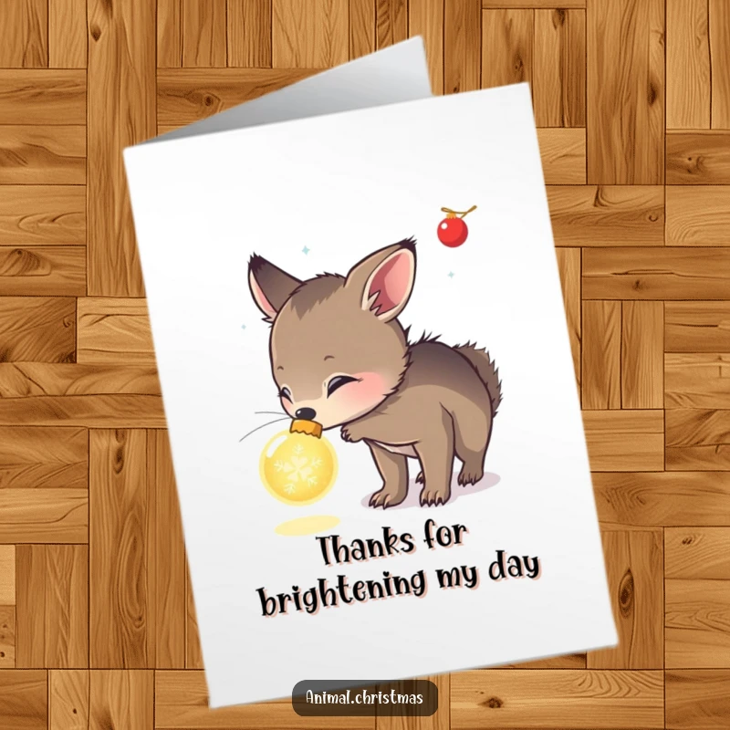 Funny Free Printable Thank You Card: A cute animal curiously sniffs a glowing Christmas ornament, expressing gratitude.
