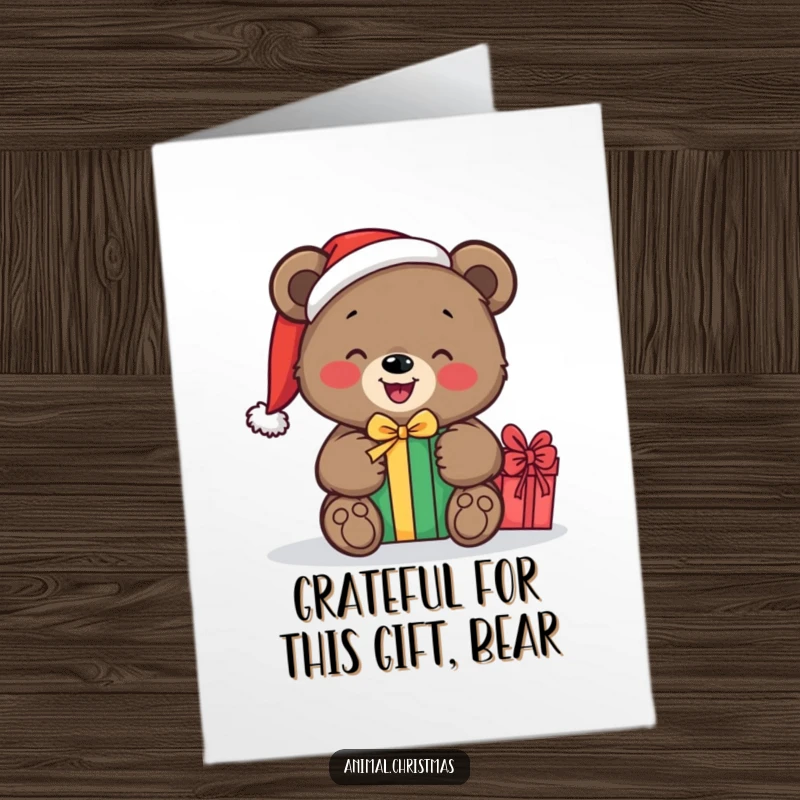 Funny Free Printable Thank You Card: A bear in a Santa hat happily unwrapping a present, conveying gratitude and delight.