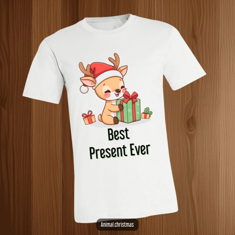 Funny kawaii deer in a Santa hat, joyfully unwrapping a gift, printed on a t-shirt, ideal for Christmas lovers.