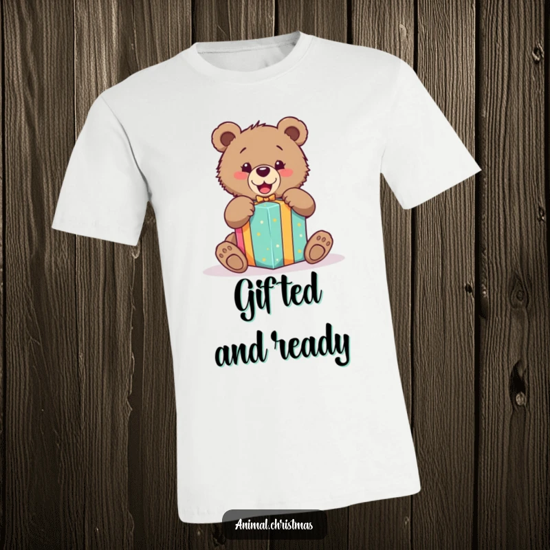 Funny t-shirt featuring a cute bear cub excitedly tearing into a brightly colored gift with pure, unadulterated joy.