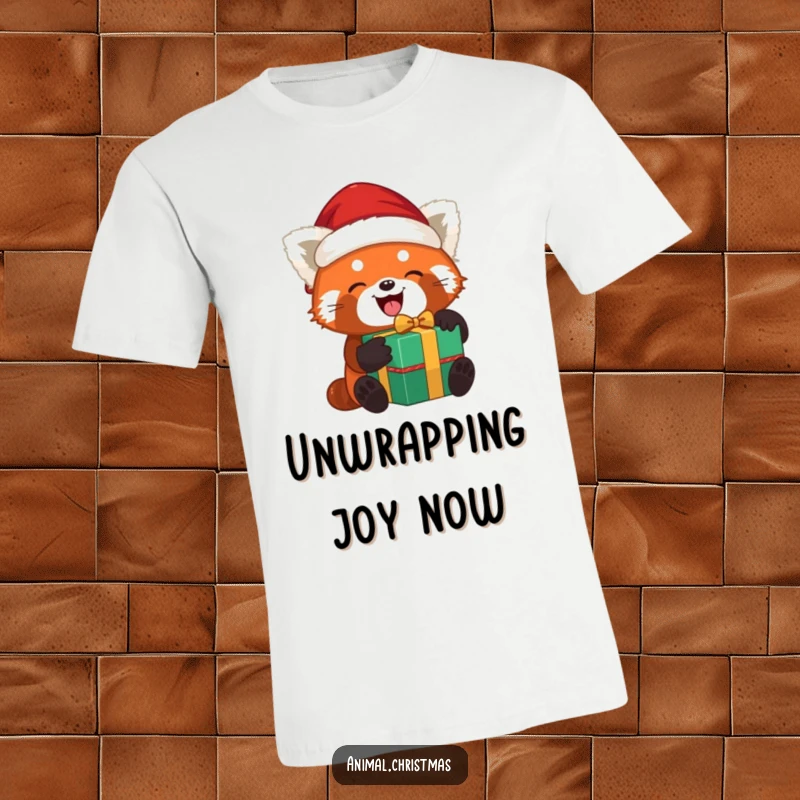 Funny red panda Santa t-shirt with a red panda joyfully unwrapping a gift while wearing a Santa hat, a charming holiday design.