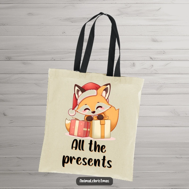 Funny Fox Santa Tote Bag, a cartoon fox wearing a Santa hat is excitedly opening a Christmas gift, perfect for holiday shopping and cheerful everyday use.